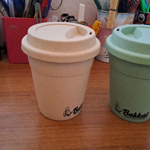 Plastic cups with lids used, set of two