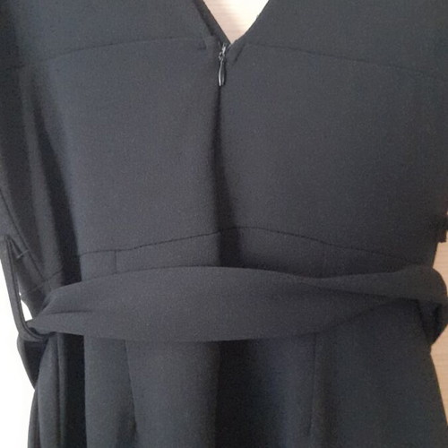 Black jumpsuit like new with zipper and belt, size M