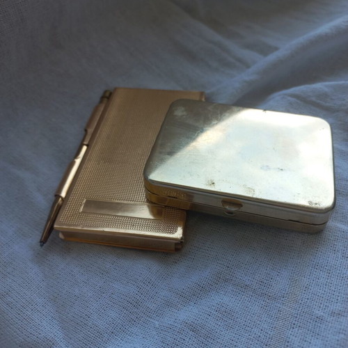 Vintage luxury set with metal notebook and travel shaving case used