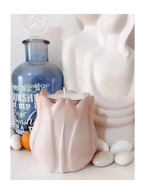 Handmade ceramic tulip-shaped tealight holder in pastel pink ombre