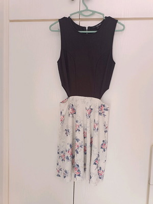 Two-tone dress like new with zipper and cutouts, size M