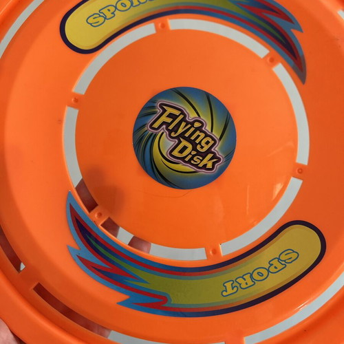 Flying Disc frisbee new, bright orange plastic