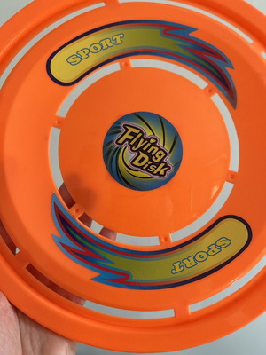Flying Disc frisbee new, bright orange plastic