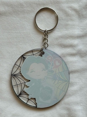 Witch with magic potion keyring like new, multicolor
