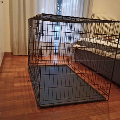 Large dog crate like new, foldable with two doors