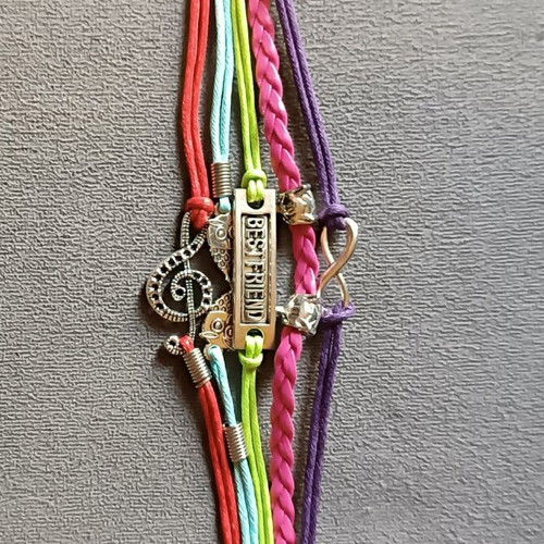 Best Friends bracelet new with multiple layers of leatherette and colorful cords