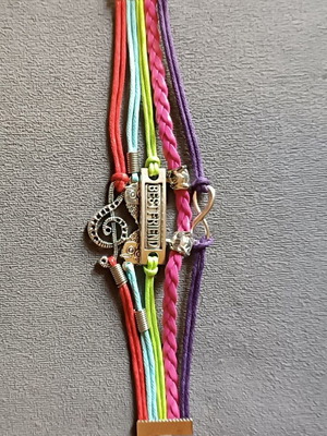 Best Friends bracelet new with multiple layers of leatherette and colorful cords