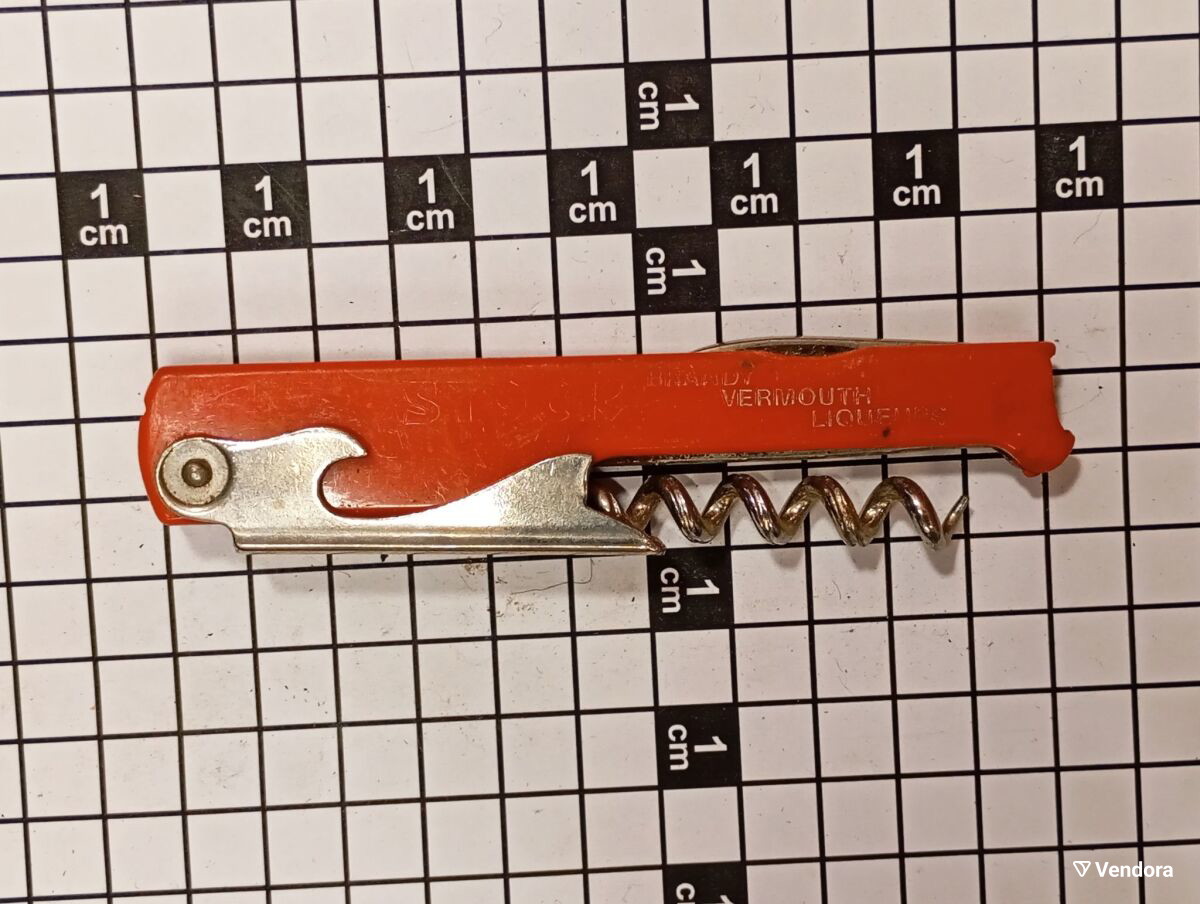 Vintage τιρμπουσόν ανοιχτήρι μπουκαλιών με το λογότυπο Stock μεταχειρισμένο