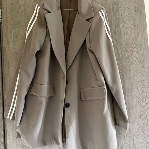 Beige jacket new, one size