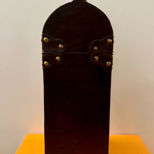 Decorative wooden case used with leatherette for bottle storage