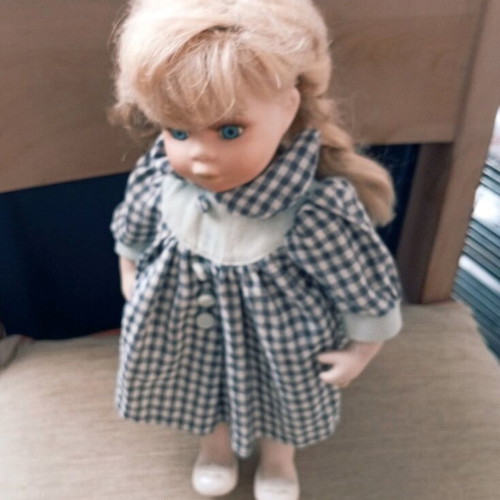 Porcelain doll used with stand, 33 cm tall