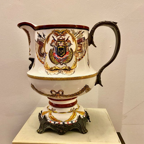Decorative ceramic pitcher with brass fittings like new