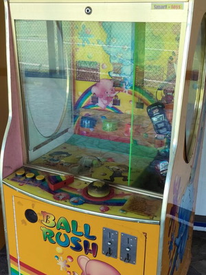 Children's machine with coin acceptor used