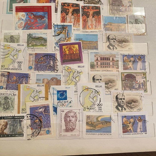 Stamp collection used with album, over 500 pieces