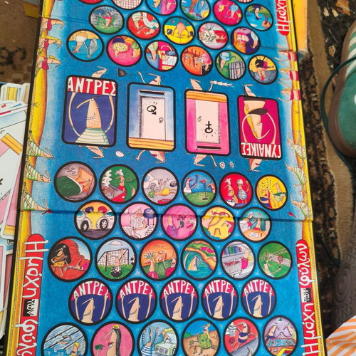 The Battle of the Sexes board game used with worn cards