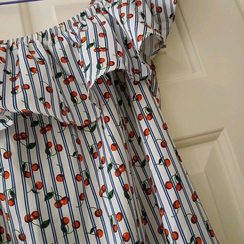 Sleeveless dress with ruffles like new, stripes and cherries print