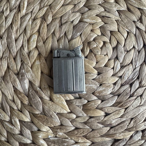 Evans Vintage lighter used with wear