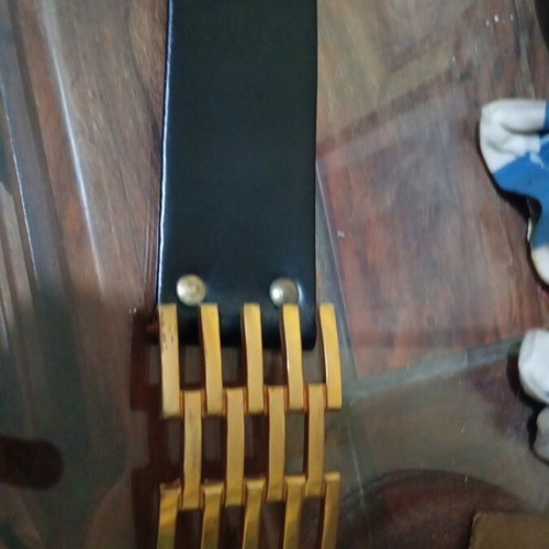 Vintage leather belt with impressive gold buckle used