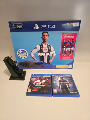 PS4 Slim FIFA Edition console like new with games and accessories