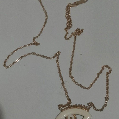 Thin gold-colored necklace used