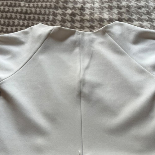 White top like new with cutouts and gold buttons size M