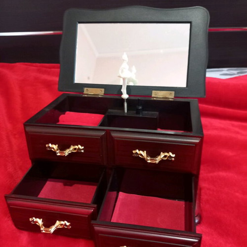 Vintage jewelry music box used with dancing ballerina