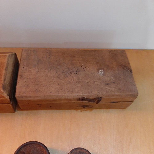 Wooden boxes with used bronze and cast iron scales set