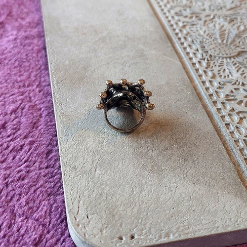Bronze skull ring with crown, rock style