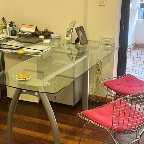 Neoset corner desk with glass top and metal legs