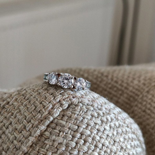 Trilogy silver plated ring used with zircon and heart motifs