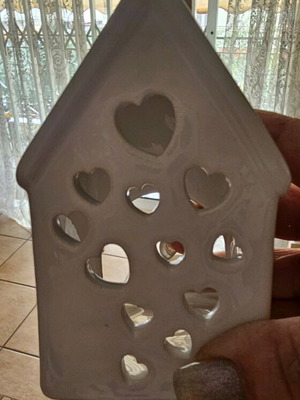 Decorative house like new with tealight holder for lighting