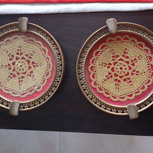 Vintage ashtrays used, ornate design