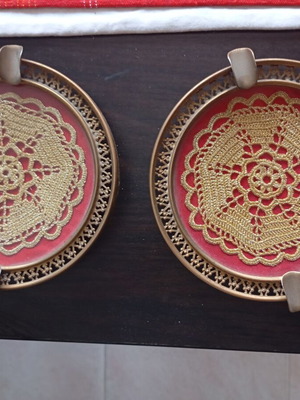 Vintage ashtrays used, ornate design