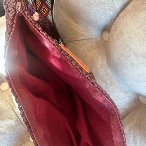 Handmade knitted crossbody bag in burgundy with geometric strap