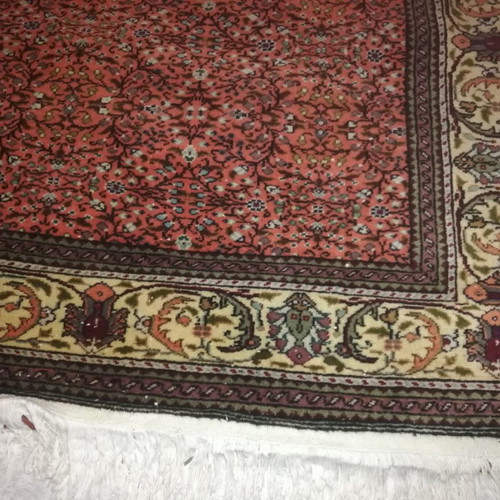 Handmade silk rug used with classic design and warm colors
