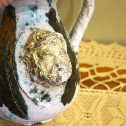 Decorative vintage jug used with mascarons