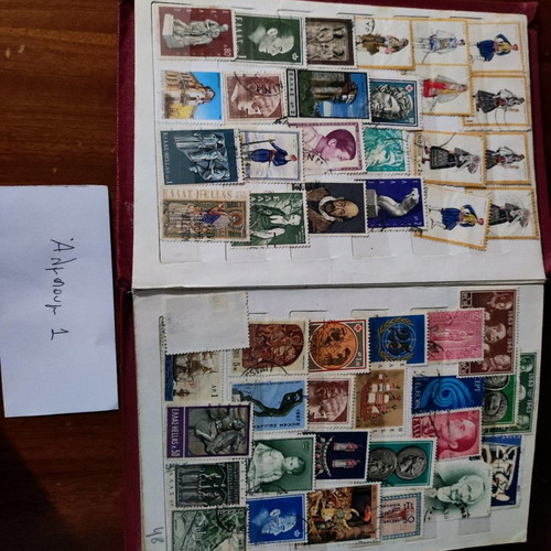 Various stamps used in 3 albums