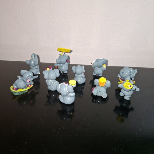 Elephant figurine collection used from Kinder Surprise with damages