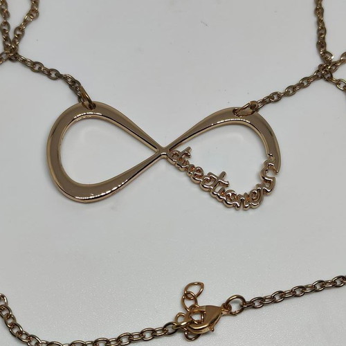One Direction Infinity Necklace like new, rose gold color