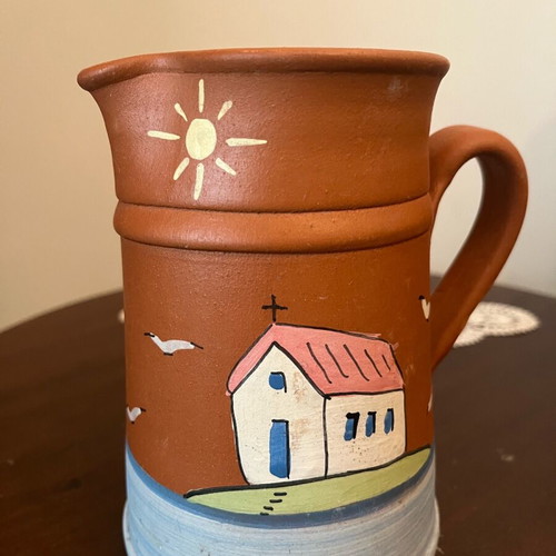 Handmade ceramic jug with painted island landscape, new