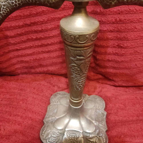 Metal triple candlestick used, ornate and heavy