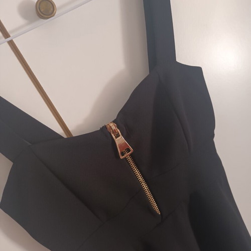 Dress black with front zipper, light chest padding, like new