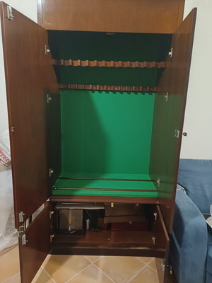 Handmade wooden gun cabinet with 26 slots, felt lining and interior light