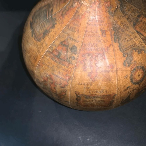 Vintage wine bottle used with Old World map design