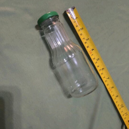 Glass decorative bottle like new for painting or storing drink or holy water