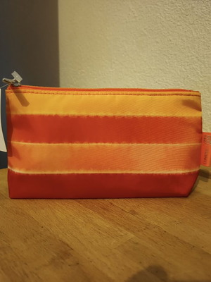 Clinique toiletry bag new, warm color design