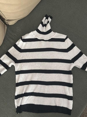 Striped turtleneck used, black and white