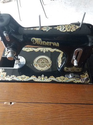 Minerva sewing machine used with table and drawers