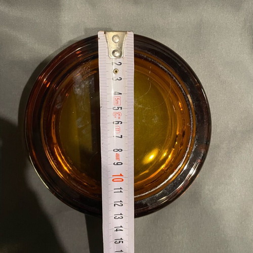 Glass ashtray like new, heavy orange vintage