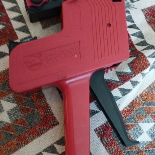 Motex MX-5500 handheld price labeler used with minor damage